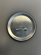  Reklam amaçlı metal yaka rozeti. GTİP 71171900 AB BTB görseli